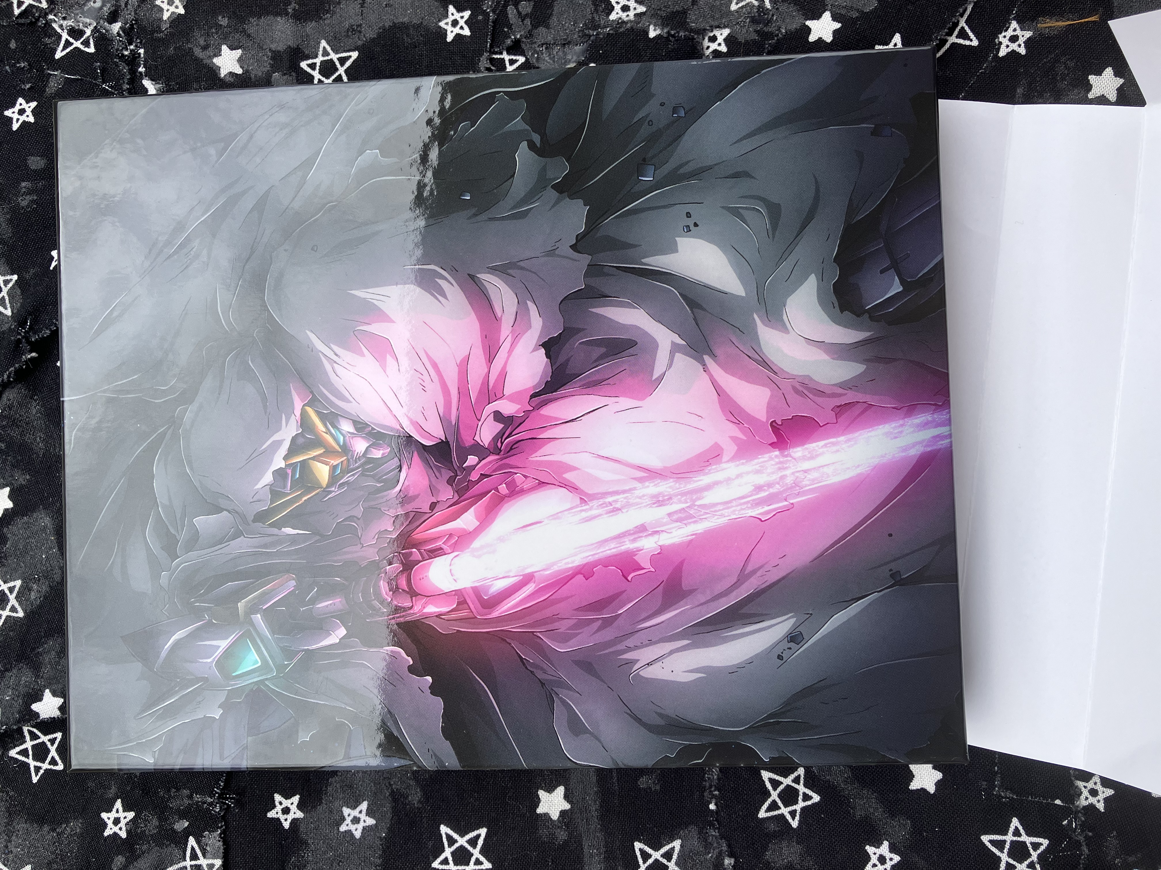 Front of Gundam wing ultra hd cover with cloaked Snow white pointing a beam saber on it.
